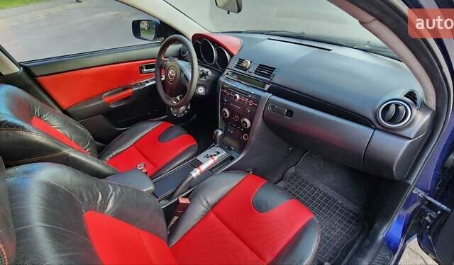Синий Мазда 3, объемом двигателя 1.6 л и пробегом 275 тыс. км за 4999 $, фото 10 на Automoto.ua