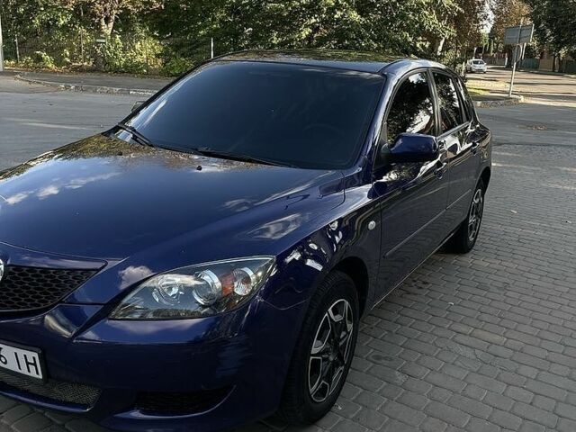 Синий Мазда 3, объемом двигателя 1.3 л и пробегом 270 тыс. км за 3797 $, фото 1 на Automoto.ua