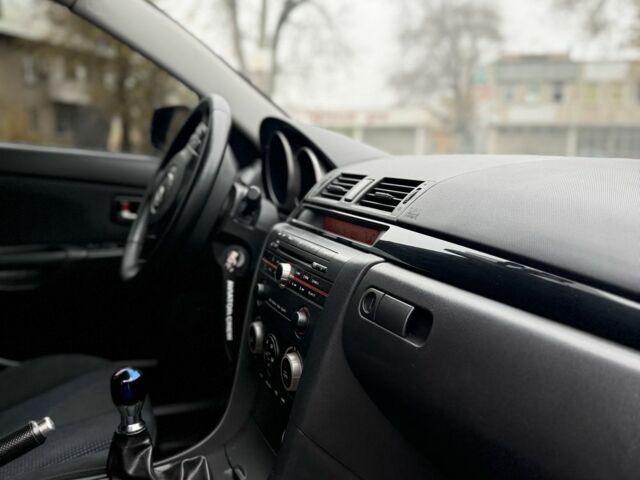 Синий Мазда 3, объемом двигателя 1.6 л и пробегом 252 тыс. км за 2950 $, фото 9 на Automoto.ua