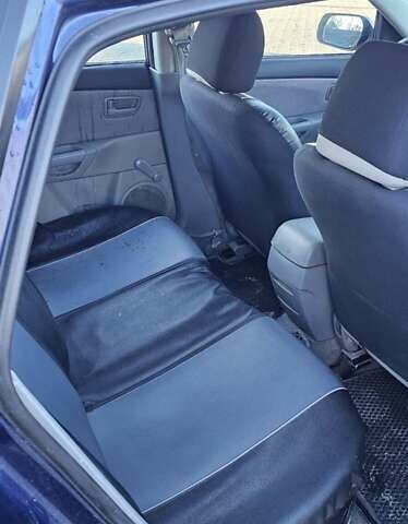 Синий Мазда 3, объемом двигателя 1.56 л и пробегом 360 тыс. км за 4200 $, фото 5 на Automoto.ua