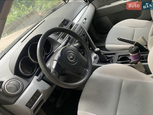 Синій Мазда 3, об'ємом двигуна 1.4 л та пробігом 269 тис. км за 4103 $, фото 8 на Automoto.ua