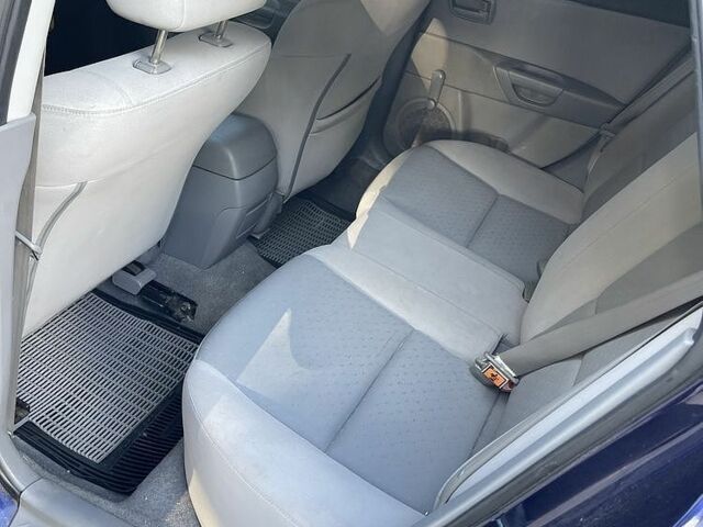 Синий Мазда 3, объемом двигателя 1.3 л и пробегом 270 тыс. км за 3797 $, фото 6 на Automoto.ua