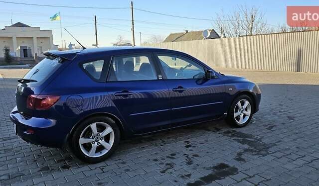 Синий Мазда 3, объемом двигателя 1.56 л и пробегом 360 тыс. км за 4200 $, фото 1 на Automoto.ua