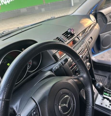 Синій Мазда 3, об'ємом двигуна 1.6 л та пробігом 240 тис. км за 5100 $, фото 4 на Automoto.ua