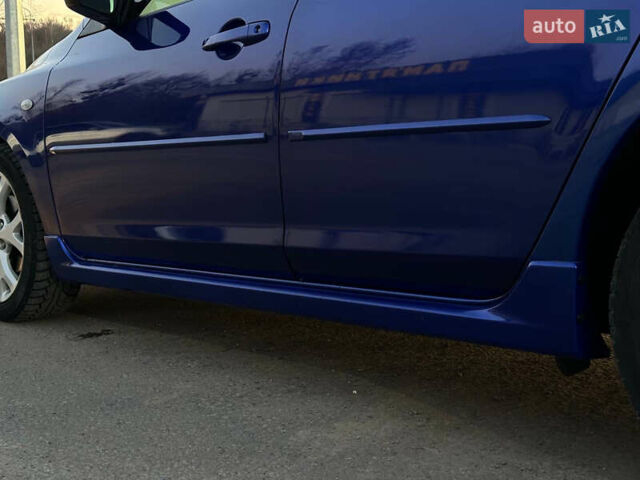 Синій Мазда 3, об'ємом двигуна 1.56 л та пробігом 238 тис. км за 5100 $, фото 16 на Automoto.ua