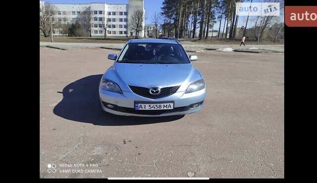 Синий Мазда 3, объемом двигателя 1.6 л и пробегом 172 тыс. км за 5800 $, фото 7 на Automoto.ua
