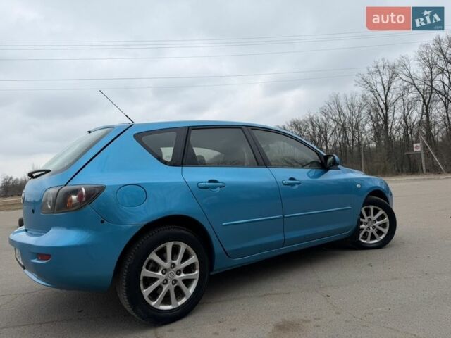 Синий Мазда 3, объемом двигателя 2 л и пробегом 254 тыс. км за 3600 $, фото 2 на Automoto.ua