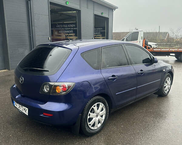 Синій Мазда 3, об'ємом двигуна 1.6 л та пробігом 235 тис. км за 3900 $, фото 2 на Automoto.ua