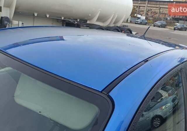 Синій Мазда 3, об'ємом двигуна 1.56 л та пробігом 358 тис. км за 3300 $, фото 5 на Automoto.ua