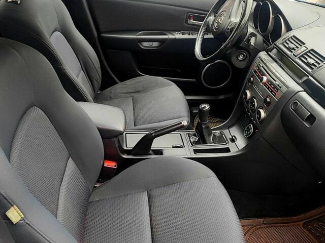 Синий Мазда 3, объемом двигателя 16 л и пробегом 158 тыс. км за 4700 $, фото 11 на Automoto.ua