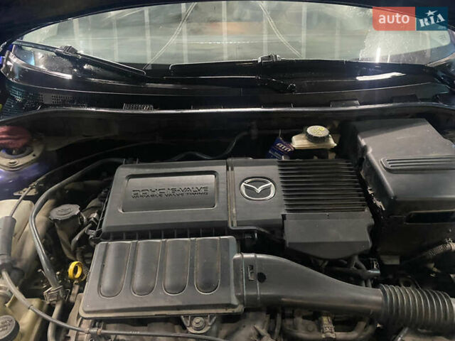 Синий Мазда 3, объемом двигателя 1.6 л и пробегом 255 тыс. км за 5000 $, фото 24 на Automoto.ua