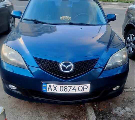 Синий Мазда 3, объемом двигателя 1.6 л и пробегом 210 тыс. км за 5300 $, фото 2 на Automoto.ua