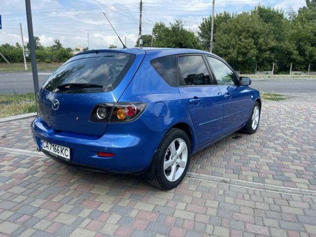 Синий Мазда 3, объемом двигателя 1.6 л и пробегом 175 тыс. км за 5900 $, фото 2 на Automoto.ua