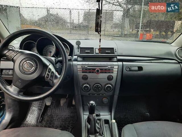 Синий Мазда 3, объемом двигателя 1.6 л и пробегом 264 тыс. км за 4300 $, фото 16 на Automoto.ua