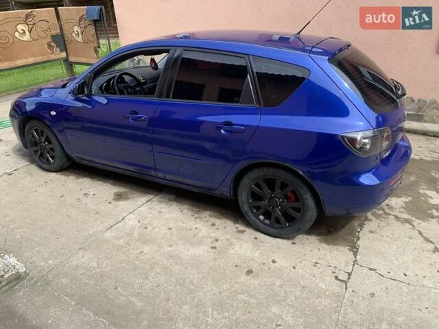 Синий Мазда 3, объемом двигателя 1.56 л и пробегом 322 тыс. км за 4000 $, фото 2 на Automoto.ua