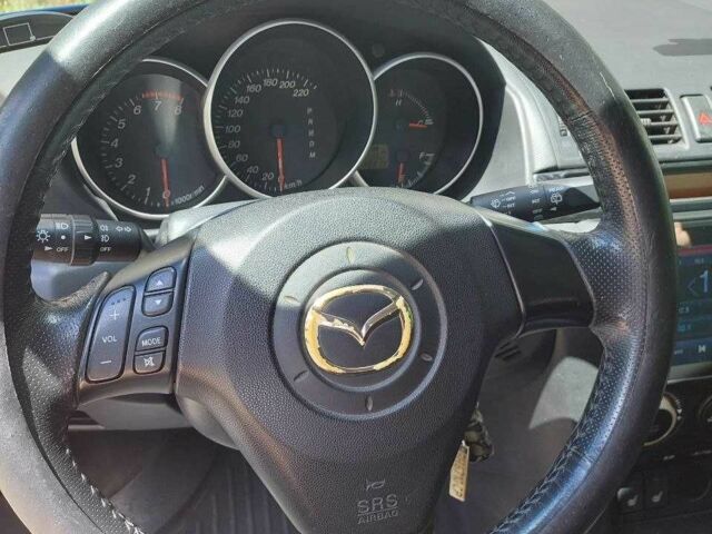 Синий Мазда 3, объемом двигателя 1.6 л и пробегом 117 тыс. км за 5500 $, фото 5 на Automoto.ua