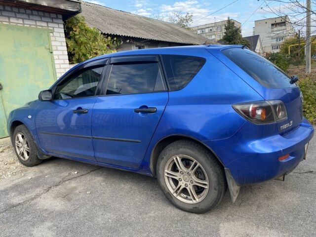 Синий Мазда 3, объемом двигателя 1.6 л и пробегом 180 тыс. км за 4000 $, фото 2 на Automoto.ua