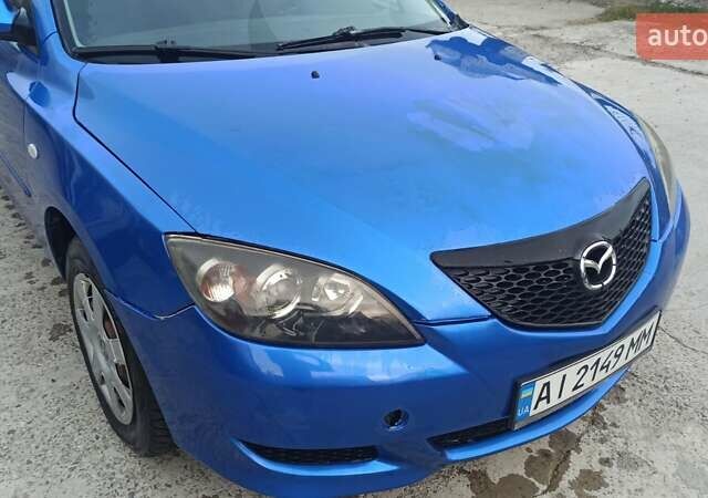 Синій Мазда 3, об'ємом двигуна 1.56 л та пробігом 358 тис. км за 3300 $, фото 9 на Automoto.ua