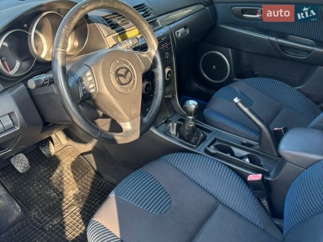 Синий Мазда 3, объемом двигателя 2 л и пробегом 301 тыс. км за 4200 $, фото 10 на Automoto.ua