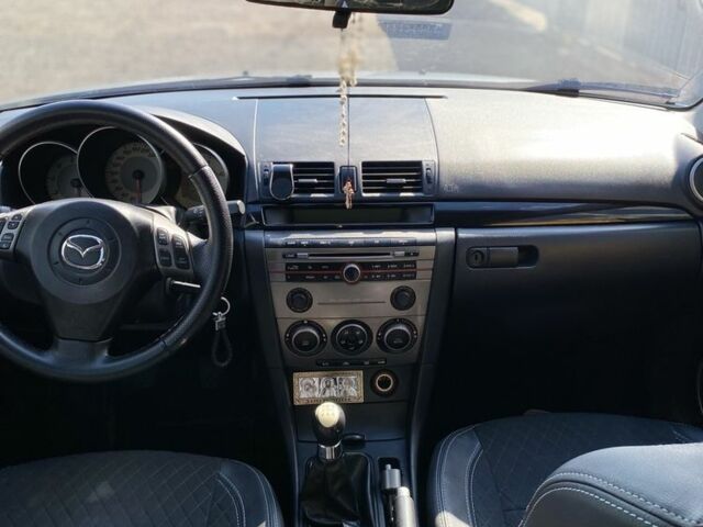 Синий Мазда 3, объемом двигателя 1.6 л и пробегом 318 тыс. км за 5000 $, фото 2 на Automoto.ua