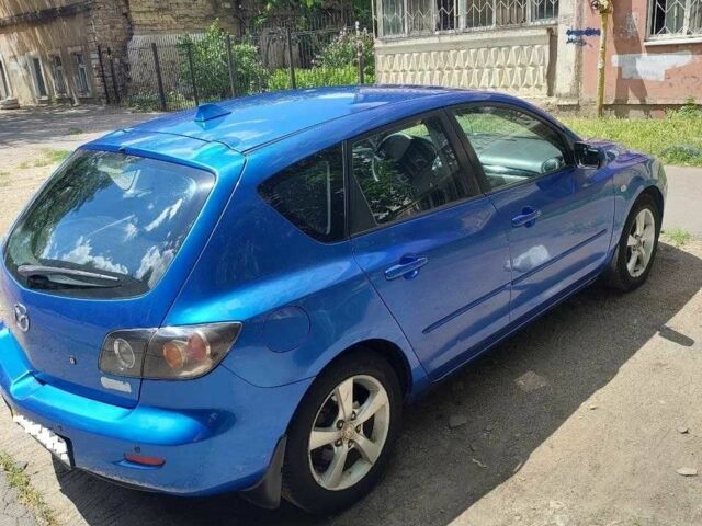 Синий Мазда 3, объемом двигателя 1.6 л и пробегом 117 тыс. км за 5500 $, фото 3 на Automoto.ua