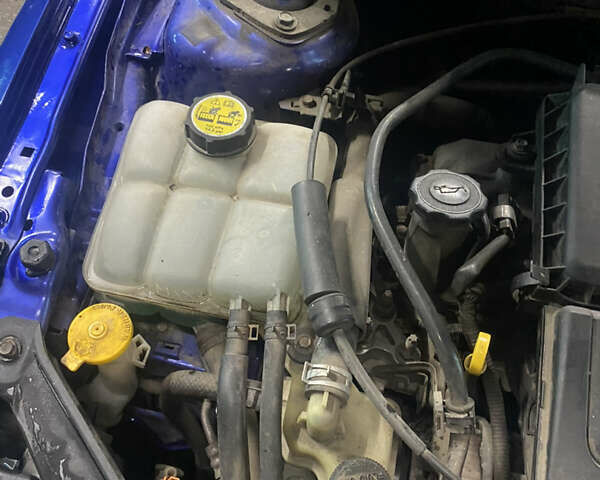 Синий Мазда 3, объемом двигателя 1.6 л и пробегом 255 тыс. км за 5000 $, фото 25 на Automoto.ua