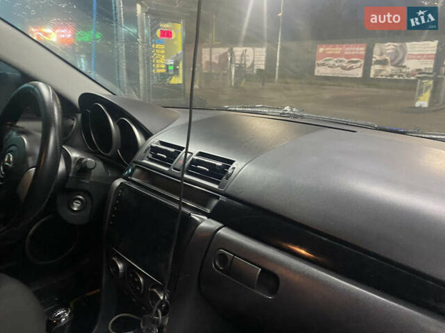 Синий Мазда 3, объемом двигателя 1.6 л и пробегом 255 тыс. км за 5000 $, фото 18 на Automoto.ua