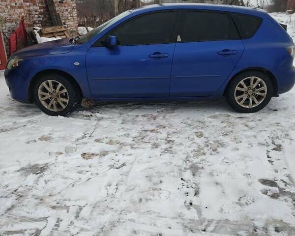 Синий Мазда 3, объемом двигателя 1.6 л и пробегом 320 тыс. км за 4000 $, фото 4 на Automoto.ua