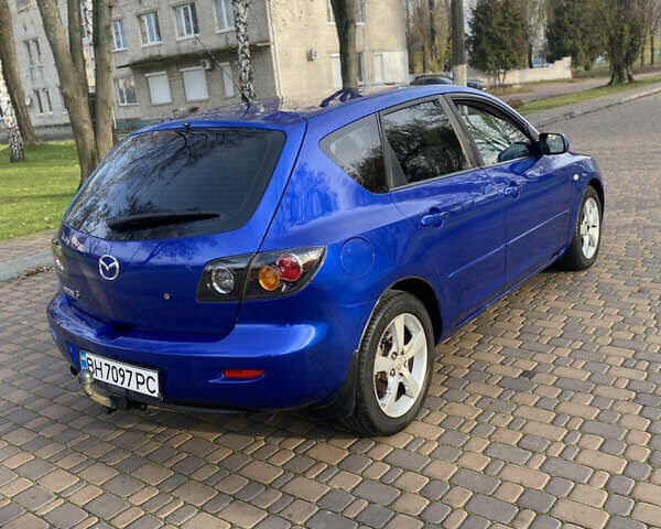 Синій Мазда 3, об'ємом двигуна 1.6 л та пробігом 286 тис. км за 4499 $, фото 4 на Automoto.ua