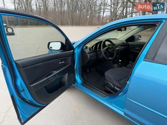 Синий Мазда 3, объемом двигателя 2 л и пробегом 254 тыс. км за 3600 $, фото 7 на Automoto.ua