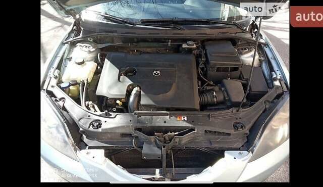 Синий Мазда 3, объемом двигателя 1.6 л и пробегом 172 тыс. км за 5800 $, фото 4 на Automoto.ua