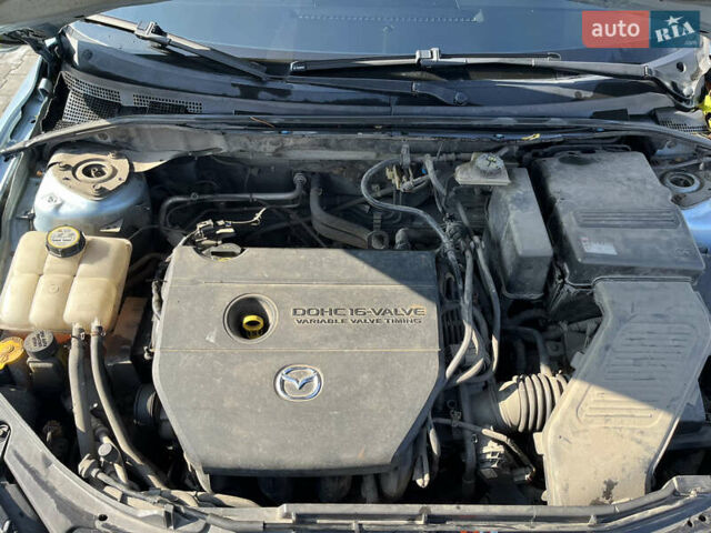 Синий Мазда 3, объемом двигателя 2 л и пробегом 307 тыс. км за 4899 $, фото 8 на Automoto.ua