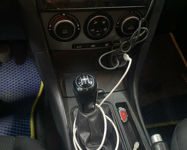 Синий Мазда 3, объемом двигателя 1.6 л и пробегом 255 тыс. км за 5000 $, фото 21 на Automoto.ua