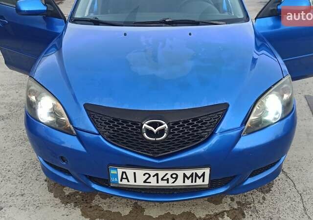 Синій Мазда 3, об'ємом двигуна 1.56 л та пробігом 358 тис. км за 3300 $, фото 7 на Automoto.ua