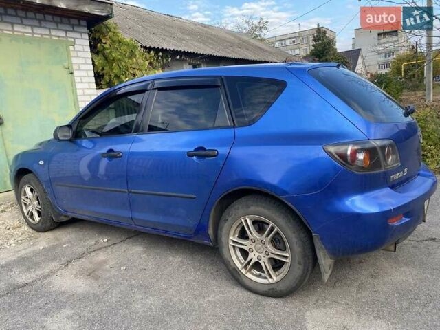 Синий Мазда 3, объемом двигателя 1.6 л и пробегом 180 тыс. км за 4000 $, фото 1 на Automoto.ua