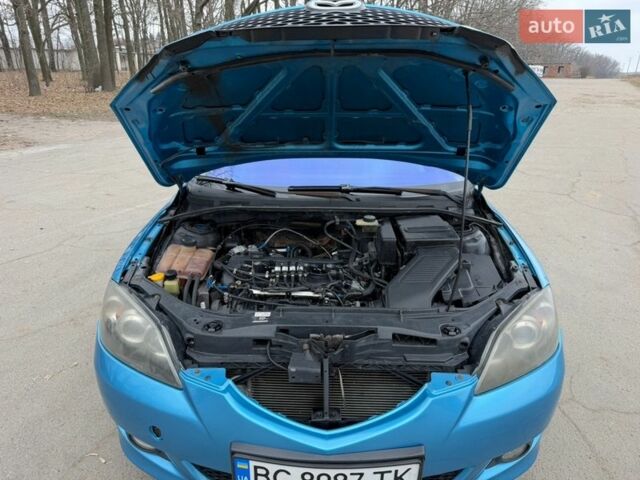 Синий Мазда 3, объемом двигателя 2 л и пробегом 254 тыс. км за 3600 $, фото 4 на Automoto.ua