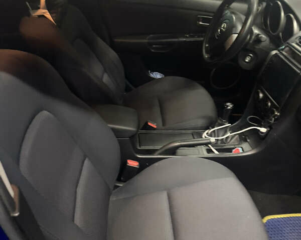 Синий Мазда 3, объемом двигателя 1.6 л и пробегом 255 тыс. км за 5000 $, фото 13 на Automoto.ua