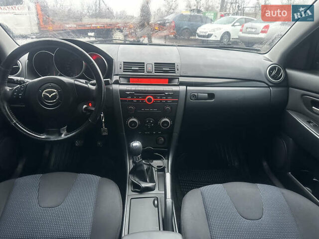 Синій Мазда 3, об'ємом двигуна 1.6 л та пробігом 235 тис. км за 3900 $, фото 8 на Automoto.ua