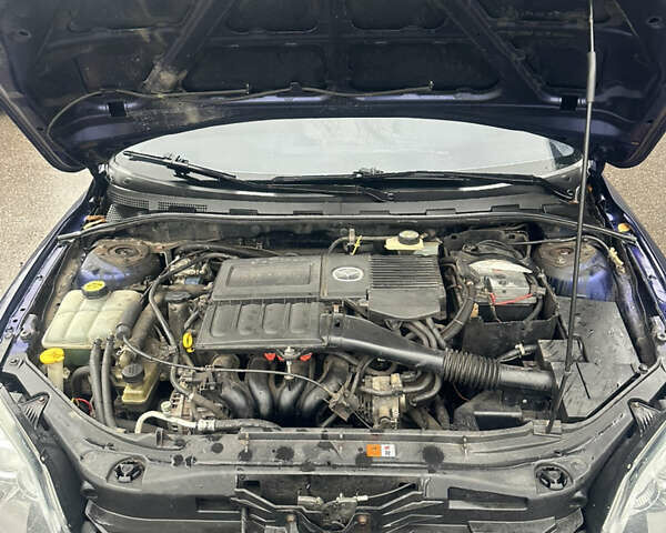 Синій Мазда 3, об'ємом двигуна 1.6 л та пробігом 235 тис. км за 3900 $, фото 9 на Automoto.ua