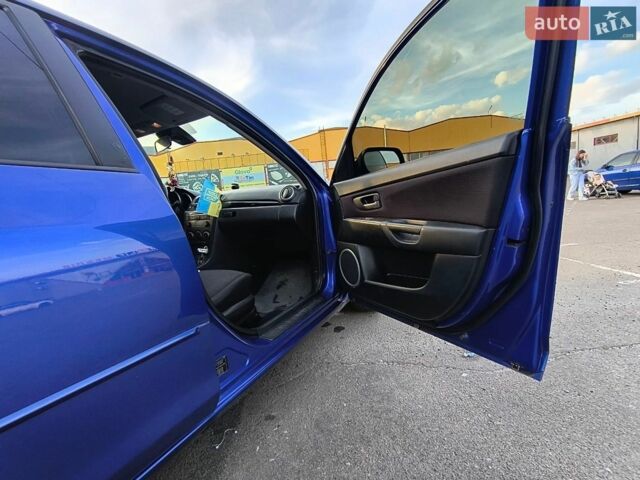 Синій Мазда 3, об'ємом двигуна 1.56 л та пробігом 357 тис. км за 4100 $, фото 9 на Automoto.ua