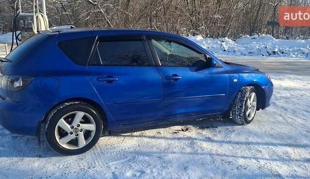 Синій Мазда 3, об'ємом двигуна 1.6 л та пробігом 269 тис. км за 3999 $, фото 4 на Automoto.ua