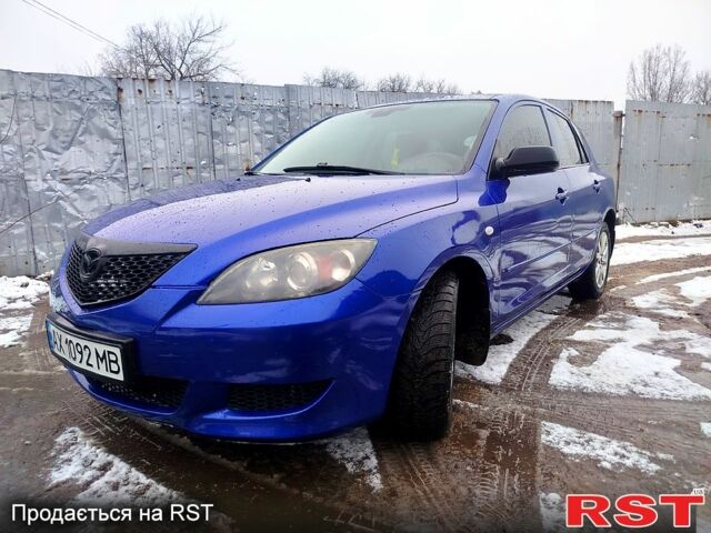 Синий Мазда 3, объемом двигателя 2 л и пробегом 230 тыс. км за 4500 $, фото 1 на Automoto.ua