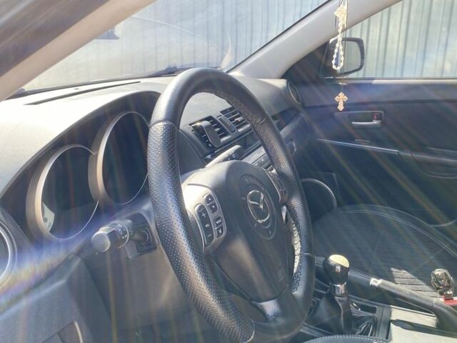 Синий Мазда 3, объемом двигателя 1.6 л и пробегом 318 тыс. км за 5000 $, фото 4 на Automoto.ua