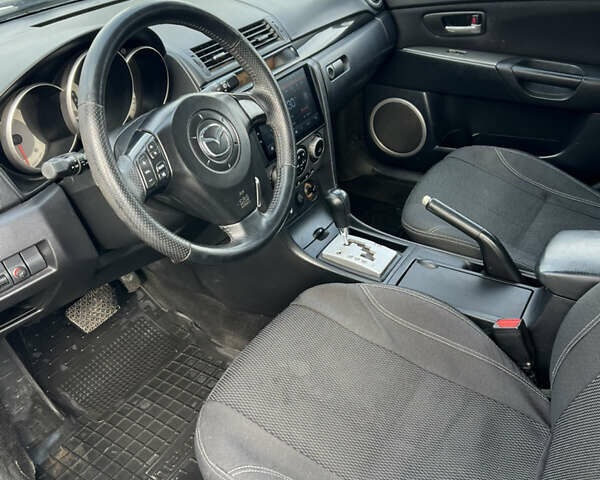 Синий Мазда 3, объемом двигателя 1.6 л и пробегом 200 тыс. км за 5200 $, фото 7 на Automoto.ua