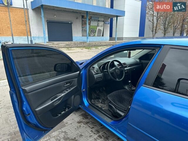 Синий Мазда 3, объемом двигателя 1.6 л и пробегом 361 тыс. км за 4850 $, фото 15 на Automoto.ua