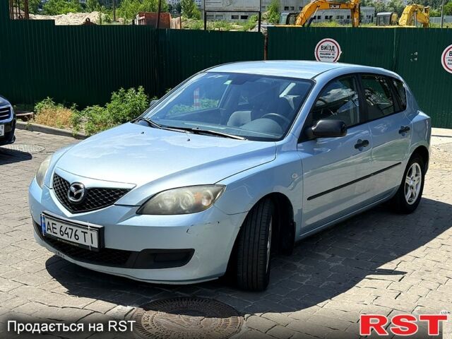 Синий Мазда 3, объемом двигателя 1.3 л и пробегом 162 тыс. км за 4000 $, фото 1 на Automoto.ua