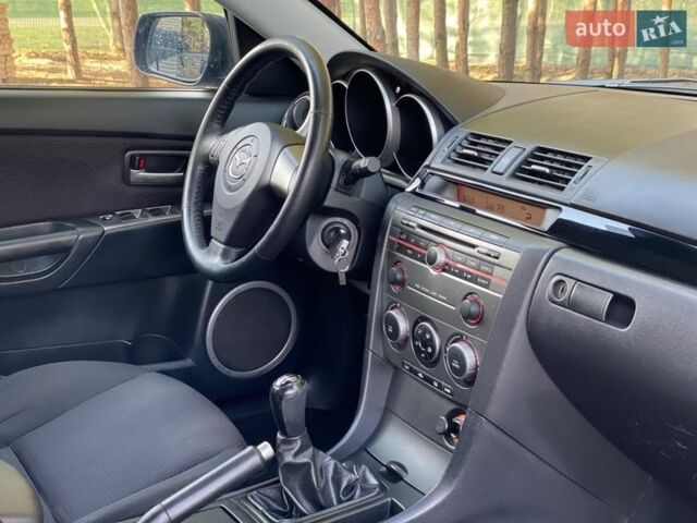 Синий Мазда 3, объемом двигателя 1.6 л и пробегом 210 тыс. км за 5300 $, фото 14 на Automoto.ua
