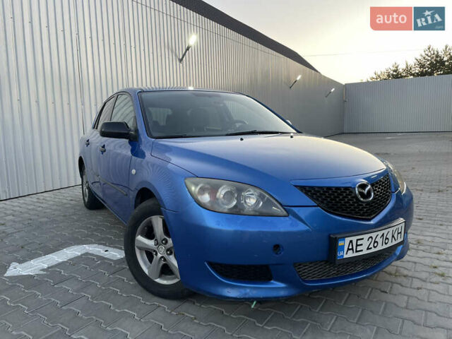 Синий Мазда 3, объемом двигателя 1.6 л и пробегом 250 тыс. км за 4300 $, фото 1 на Automoto.ua