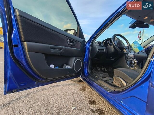 Синій Мазда 3, об'ємом двигуна 1.56 л та пробігом 357 тис. км за 4100 $, фото 26 на Automoto.ua