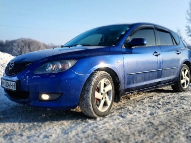 Синий Мазда 3, объемом двигателя 1.6 л и пробегом 269 тыс. км за 4099 $, фото 1 на Automoto.ua